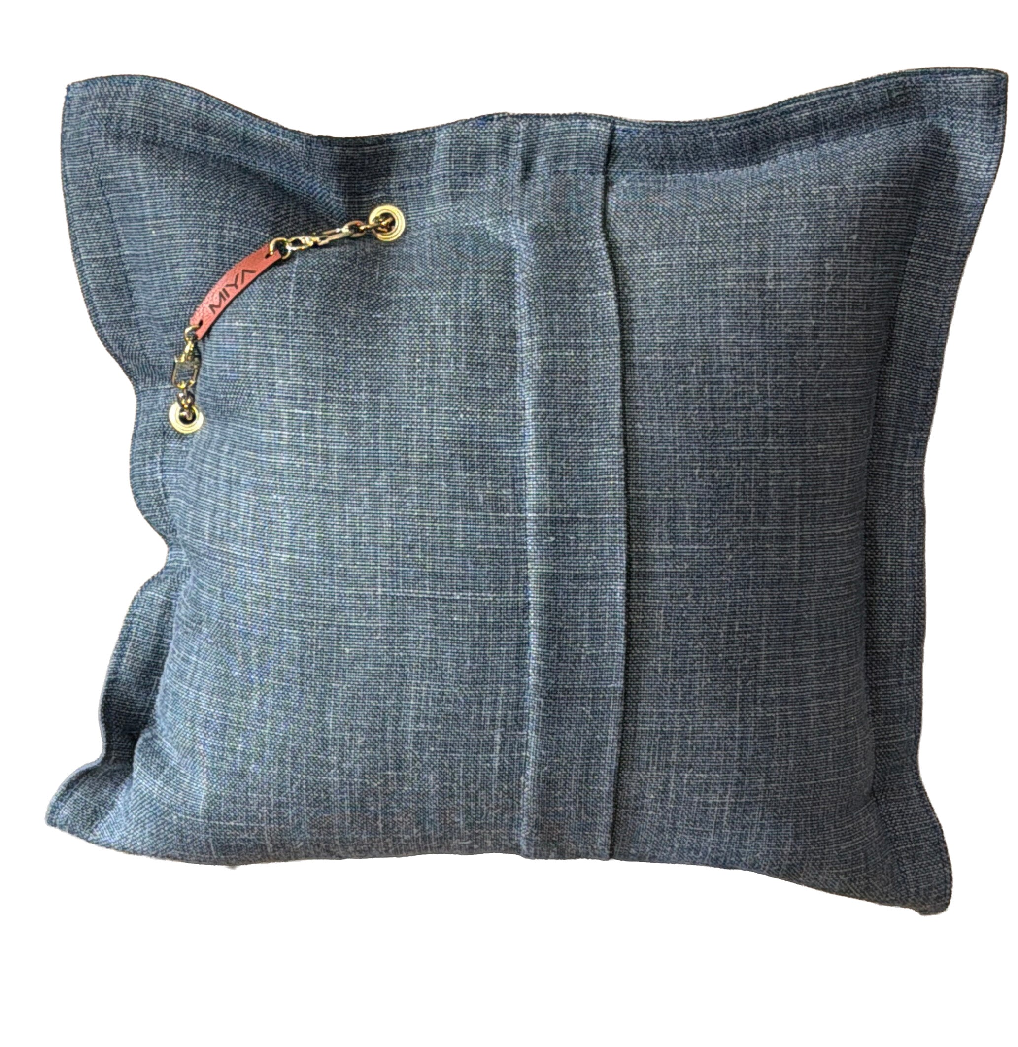 Back view of the handmade blue linen throw pillow with envelope closure and MIYA leather tag.