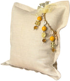 Coussin en lin MIYA vue de côté, papmille jaune poids ashanti