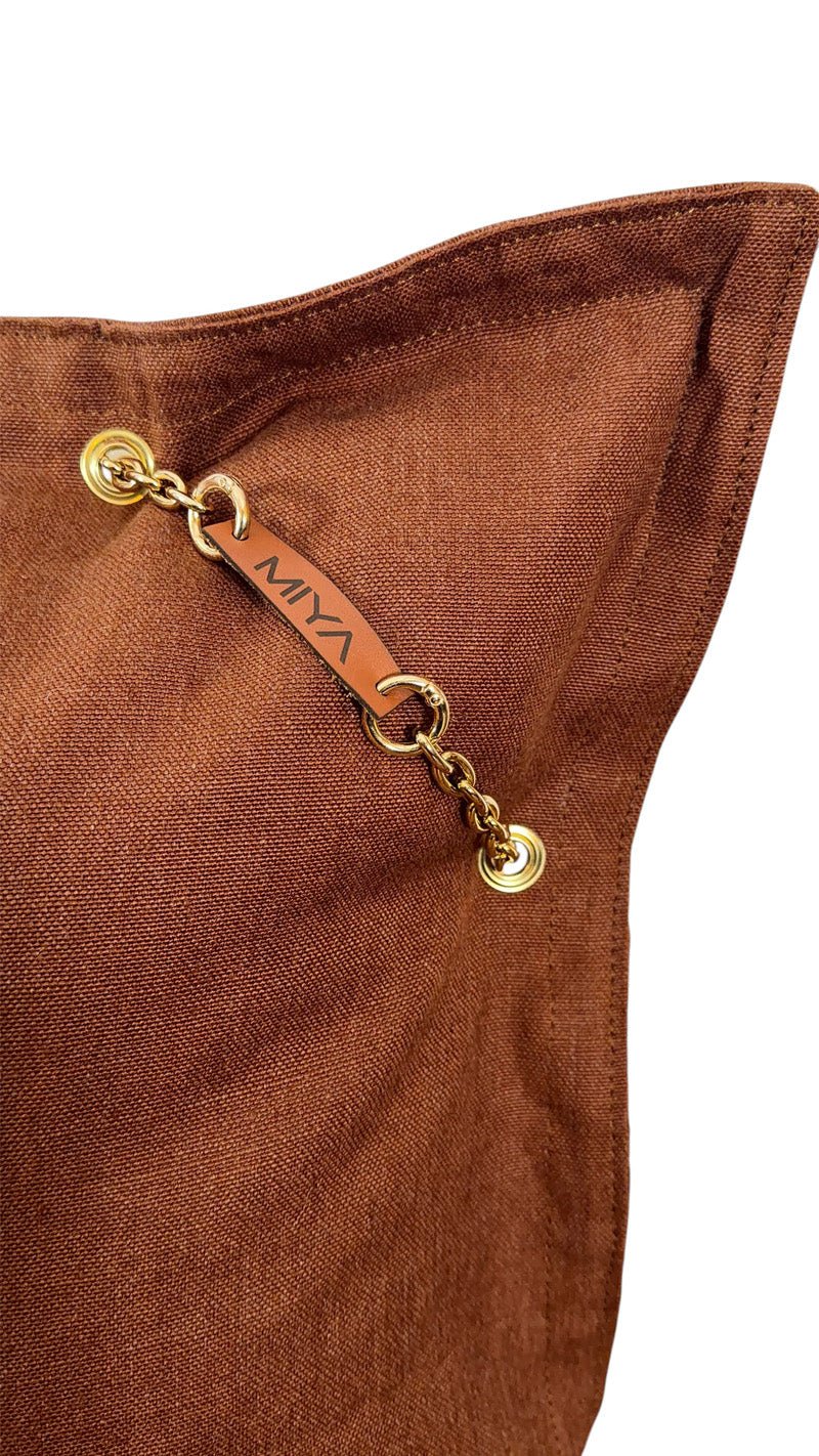 Coussin terracotta dos avec pampille signature MIYA poids Ashanti et perles